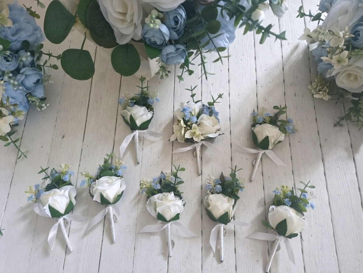 Dusty blue & ivory buttonholes & dress corsage